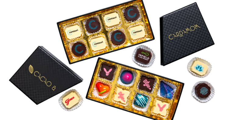 Cacao & Cardamom chocolate gift boxes with customized designs on the chocolates.