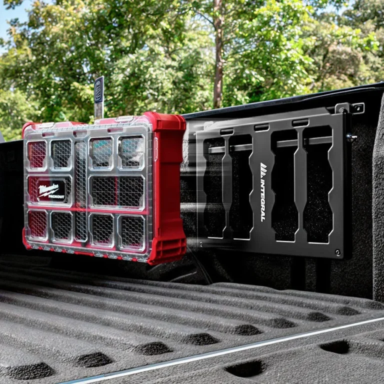 Integral Truck storage panel securing a red tool organizer inside a truck bed.
